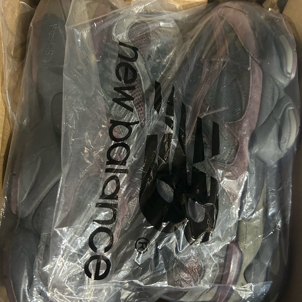 New Balance Sneakers in Black and Purple
